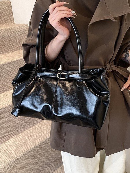 Vintage Leather Shoulder BagElevate your everyday look with sleek urban simplicity. Crafted in premium coffee-toned PU leather with a structured horizontal silhouette. Features a secure lock closure, built-in center divider, and double straps for effortless style.